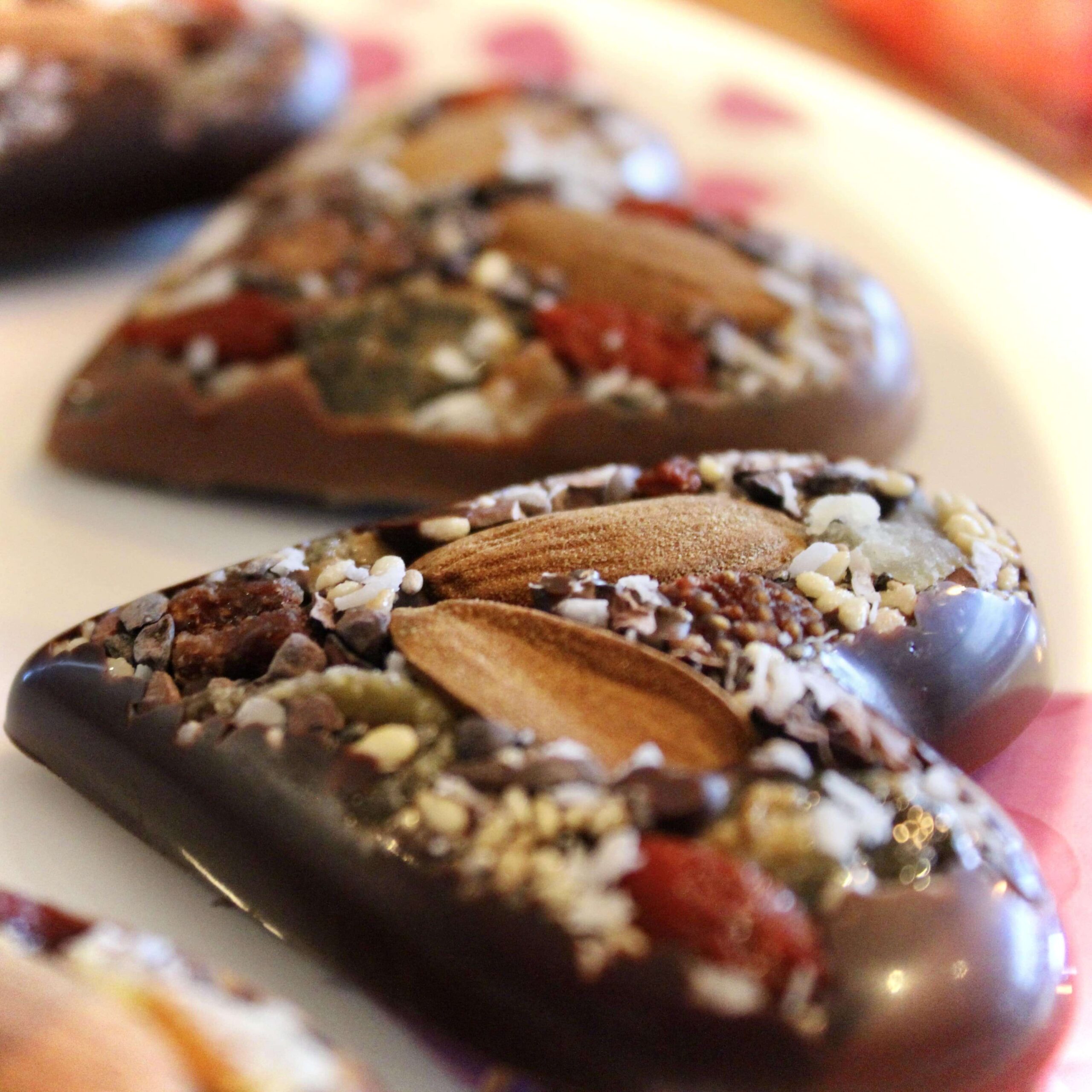 hilde devolder chocolatier heart with dried fruit nut seed milk and dark organic fairtrade chocolate peru 39 and 70